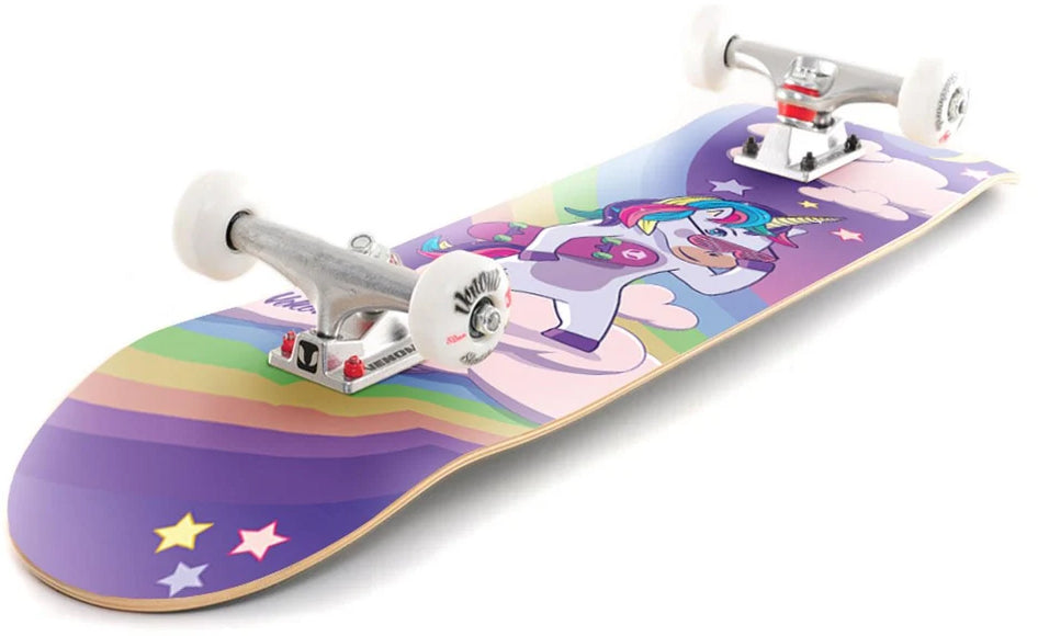 Venom Junior Unicorn Night Kids Complete Skateboard - 7.25″ x 29″ featuring a cartoon unicorn wearing sunglasses and holding a board on a purple background with rainbows, clouds, and stars.