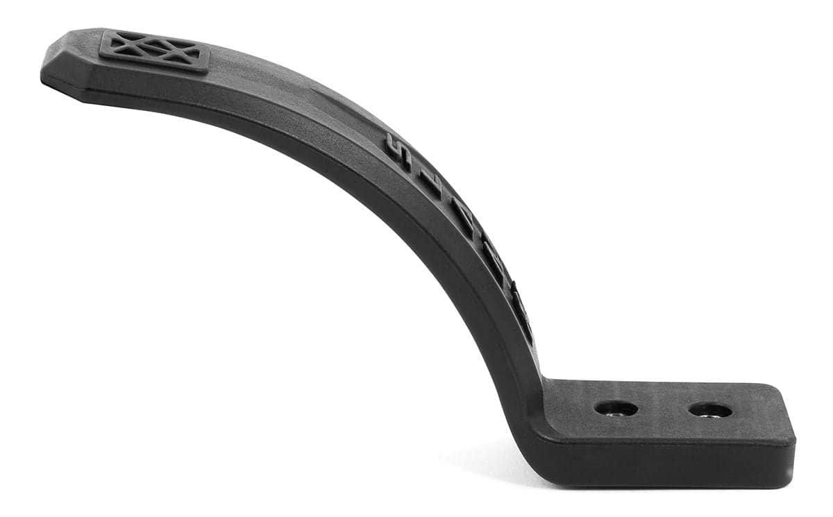 The Slamm Nylon Stunt Scooter Flex Fender in black is designed with a curved shape and textured details. Made from reinforced nylon, it features two screw holes on the flat base and is displayed against a white background.