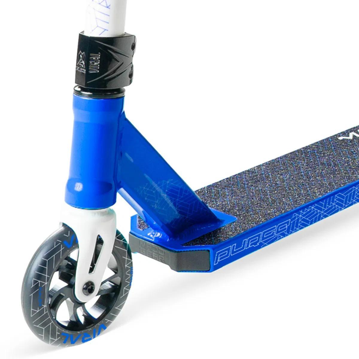 Close-up of the Madd Gear (MGP) Viral Purge Complete Stunt Scooter - Cobalt, highlighting the metallic core front wheel, grip tape deck with geometric patterns, and handlebar stem—ideal for your next skatepark adventure.