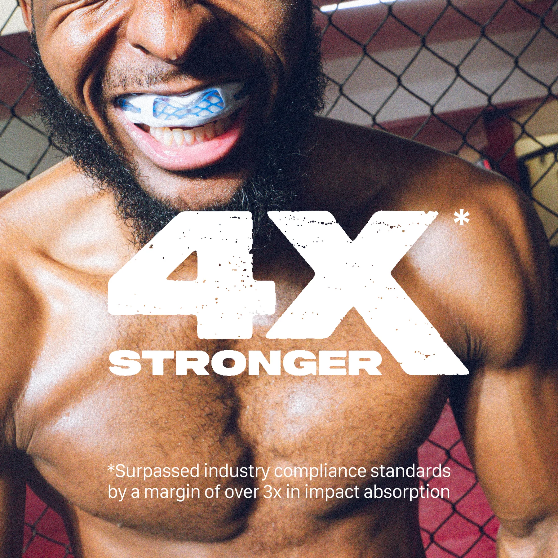 A strong man wearing the Safejawz Nitro Series Protection Mouthguard in white/blue smiles before a chain-link fence. Bold text says "4X STRONGER." Smaller text notes this Safejawz mouthguard exceeds industry standards in impact absorption.