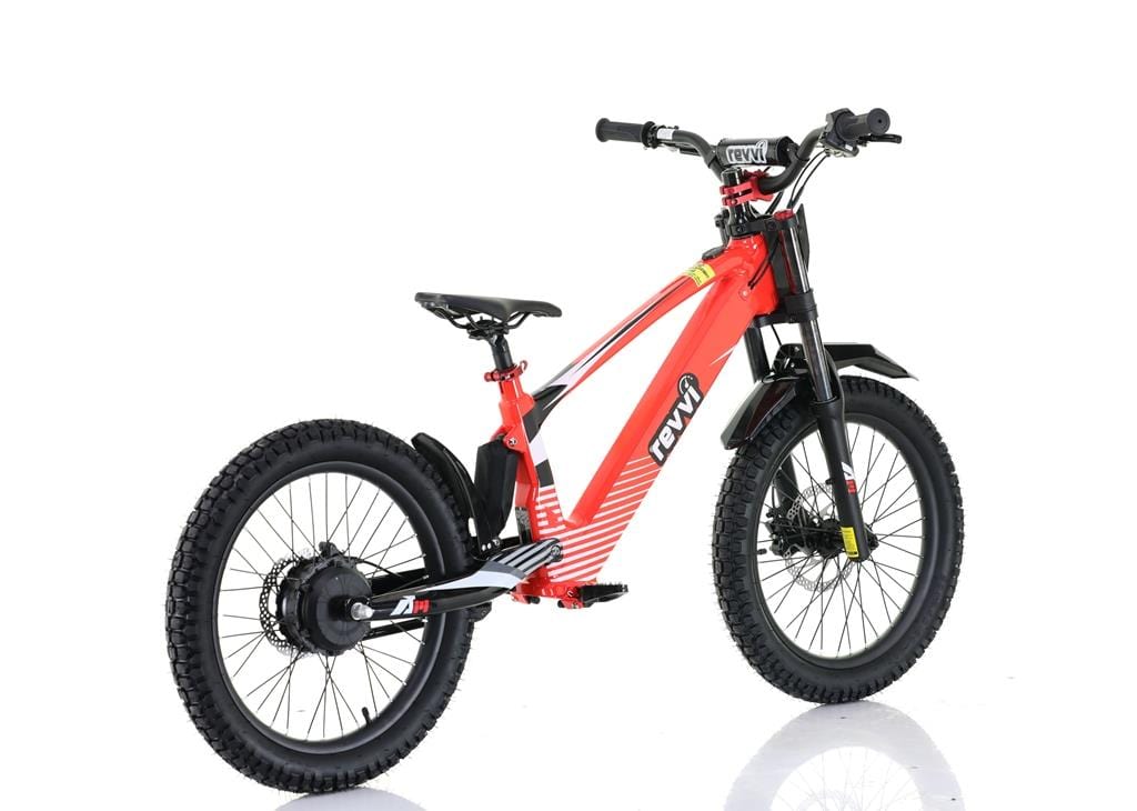 The Revvi 20" Kids Electric Balance Bike - Red features thick off-road air-filled tires, a sturdy frame, padded seat, front suspension fork, and wide handlebars for off-road thrills. A visible motor enhances the rear wheel. Displayed against a white background.