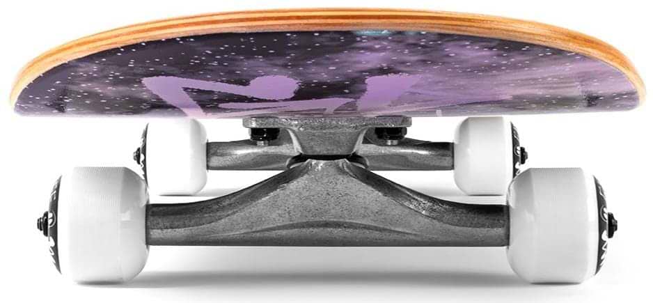 The Enuff Skully Hologram Black Complete Skateboard (7.75" x 31.5") features metallic trucks and light-colored wheels set against a cosmic-themed, 7-ply maple deck with a skeleton silhouette, making it an excellent entry-level board.