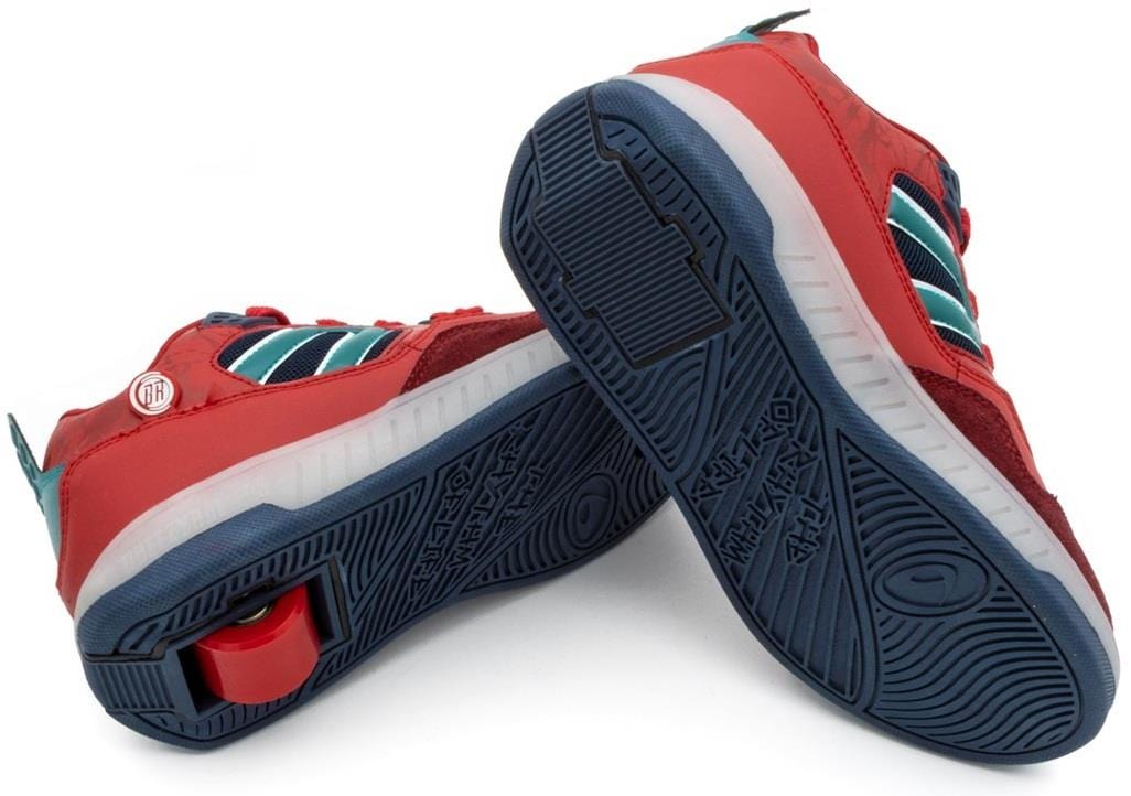 The Breezy Rollers Light Beam Shoes - Red / Blue feature a dark blue sole and a retractable wheel in the heel, combining style and fun; perfect for rolling on the go from Breezy Rollers.