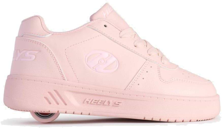The Heelys Kama Girls Shoes - Pink combine classic court style with fun, featuring a light pink design, single low-profile wheel in the heel, lace-up front, and side logo.