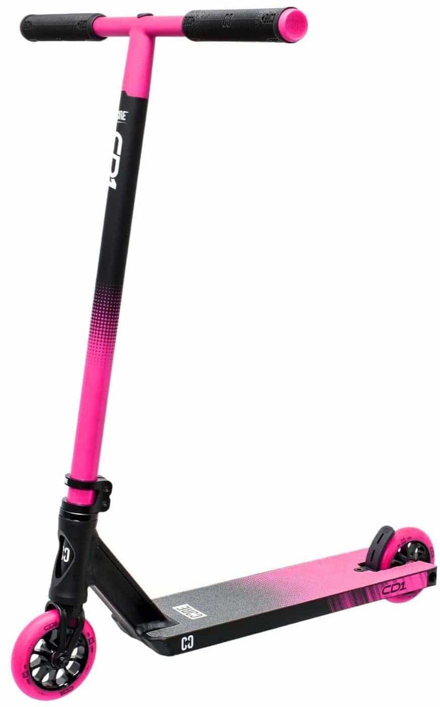 Introducing the CORE CD1 Complete Stunt Scooter by CORE, featuring a sleek aluminum deck with a captivating gradient effect, black handlebars, and vibrant pink accents on the handle grips, wheels, and rear brake. This brightly colored scooter is perfect for beginner riders seeking style and functionality.