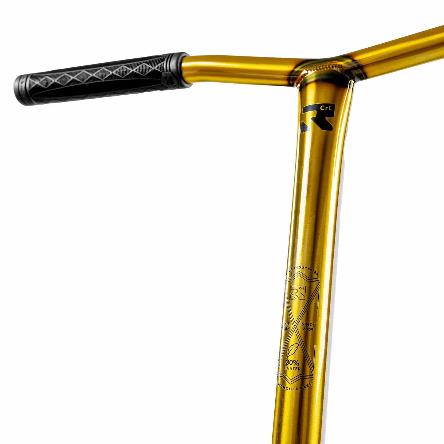 Close-up of the Root Industries Invictus V3 Complete Stunt Scooter handlebar in Burnt Gold, showing a black textured grip with geometric patterns and technical specs on the metal. The background is white.