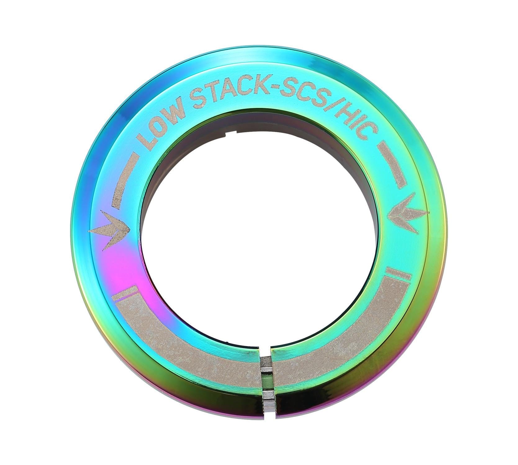 The Blunt Envy Low Stack SCS Integrated Stunt Scooter Headset in Oil Slick Neochrome is a metallic, iridescent piece designed for an SCS Stunt Scooter. It features engraved arrows and a slit across the bottom, with its rainbow-like sheen enhancing its role in the compression system.