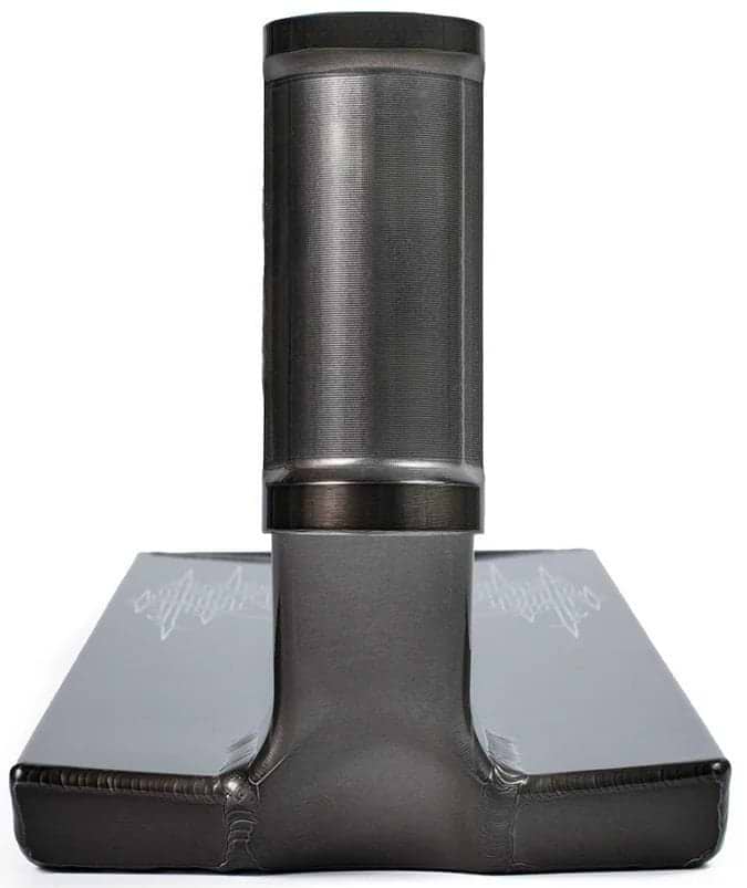 A close-up of the Tilt Selects Gagliano Signature Clear Black Stunt Scooter Deck (6.5" x 22.2") reveals smooth welds and a sleek, industrial finish, highlighting its welded 6061-T6 aluminum structure with a cylindrical tube on a rectangular base.