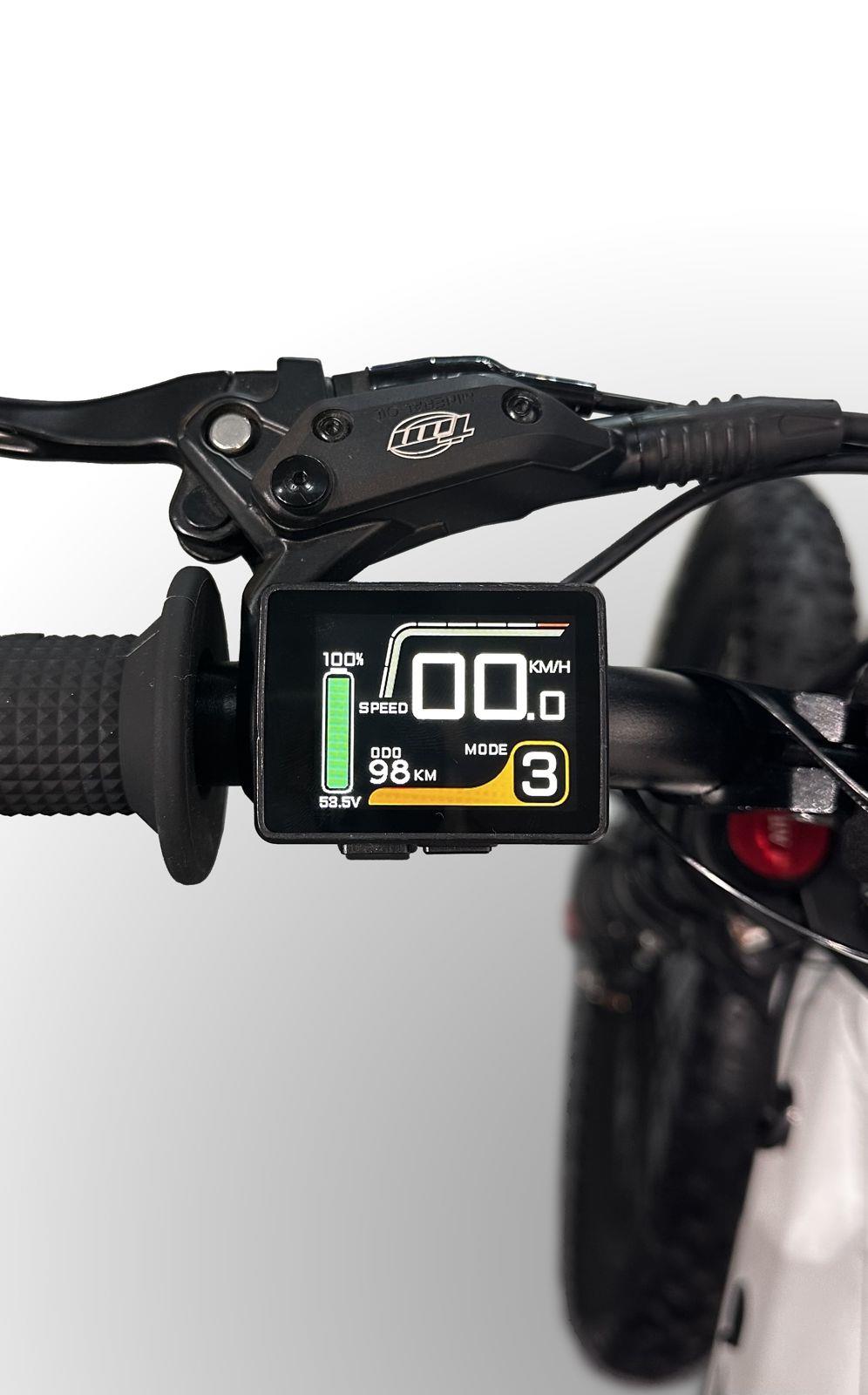 Close-up of the Duo 20" Blitz Kids Electric Balance Bike (White/Black) handlebar featuring a digital display with speed, battery %, 3 power modes, odometer (98.0 km), and various controls against a white background.
