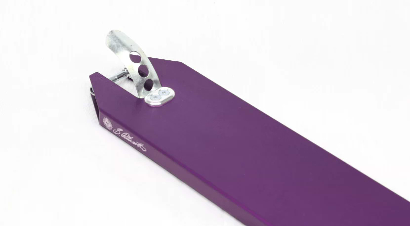 The close-up shot of the Apex Pro Bianca Dilworth Signature Purple Stunt Scooter Deck, measuring 5" x 19.3", highlights its impressive geometric design with a silver brake attached. The sleek finish of this deck contrasts beautifully against the plain white background.