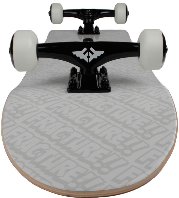 A close-up, front-facing view of the Fracture All Over Comic White Complete Skateboard (8.25" x 31.75") by Fracture, featuring white wheels, black trucks, and a light gray deck with bold “FRACTURE!!” branding.