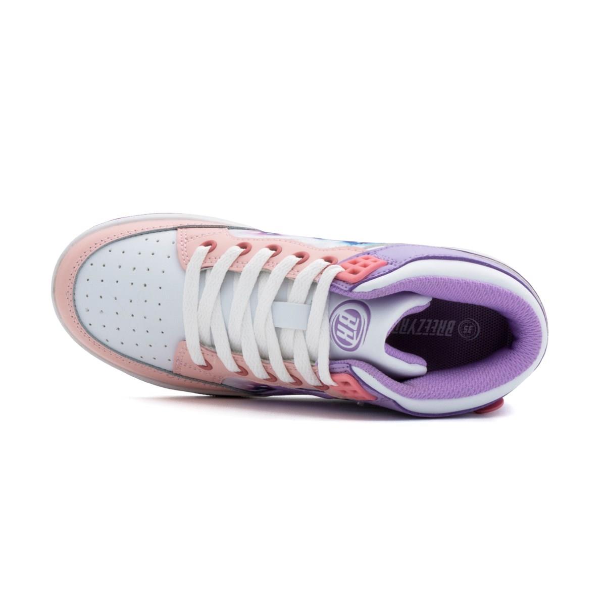 A top view of Breezy Rollers Skater Girls Shoes in white, purple, and pink with a white toe, lavender and pink accents, white laces, perforated toe box, “BREEZY” on the tongue, and a purple inner lining by Breezy Rollers—ideal for skater shoe fans.