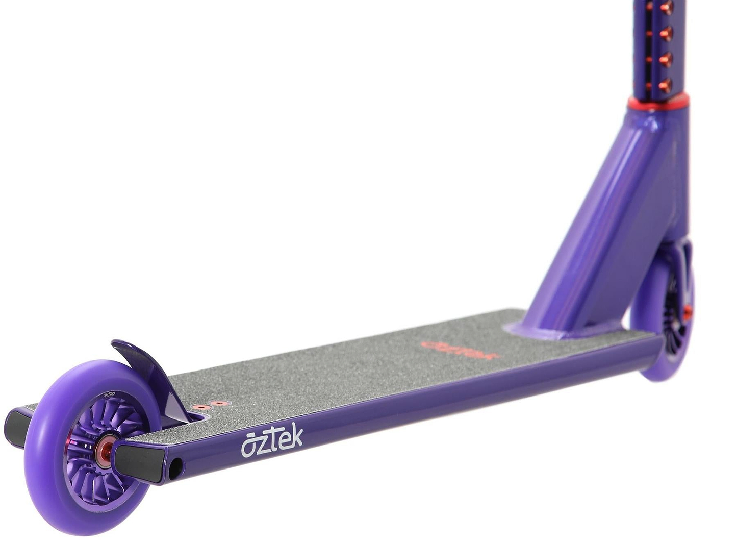 Close-up of the Aztek Architect 2 Complete Stunt Scooter in Viola Purple, featuring the deck with a textured black grip, visible rear wheel, handlebar stem, and the "Aztek" brand name printed on the side of this durable stunt scooter.