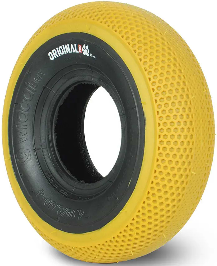 The Wildcat Original Pro 10" Mini BMX Tyre Dog Toy features a gum yellow honeycomb pattern, black ring with "ORIGINALE" label, and is designed by Wildcat for chewing durability.