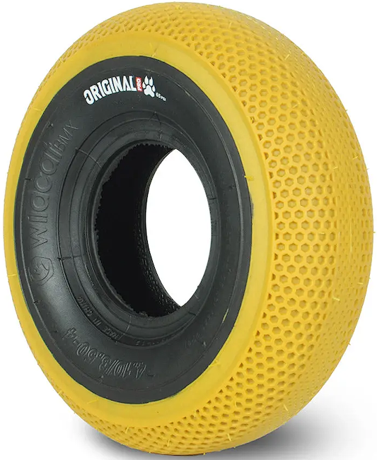 The Wildcat Original Pro 10" Mini BMX Tyre Dog Toy features a gum yellow honeycomb pattern, black ring with "ORIGINALE" label, and is designed by Wildcat for chewing durability.