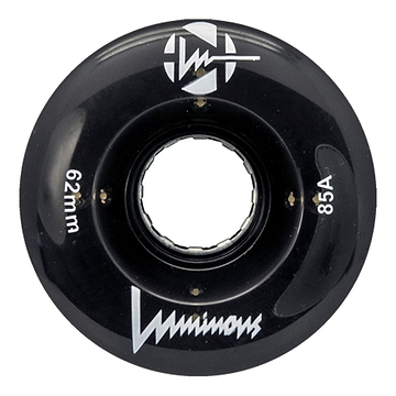 The Luminous LED 85A Quad Roller Skate Wheel in black features white logos, "62mm" left, "85A durometer urethane" right, and "Luminous" script at the bottom. Central hole fits standard skate wheel bearings. Brand: Luminous.