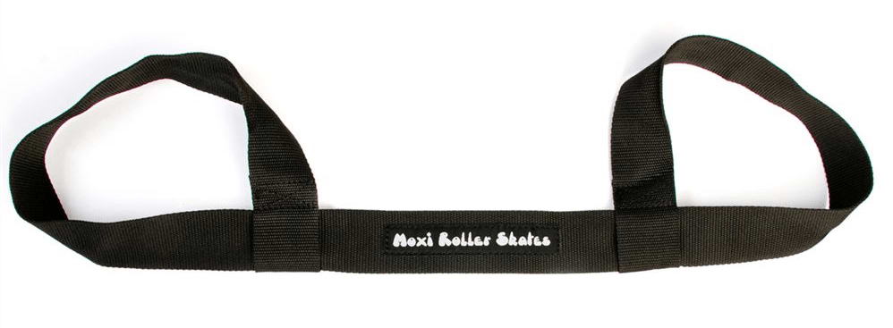 Close-up of the Moxi Roller Skate Leash - Black, a black nylon skate accessory by Moxi featuring two loops on each end and "Moxi Roller Skates" embroidered in white on the strap.