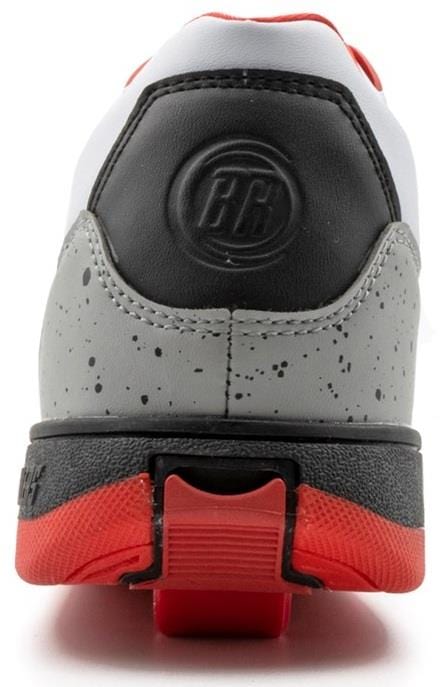 Rear view of Breezy Rollers Jumper Shoes by Breezy Rollers in white, grey, and red, featuring a black heel, gray speckled midsection, red outsole, round heel logo, and patented wheel system with visible metal cleat.