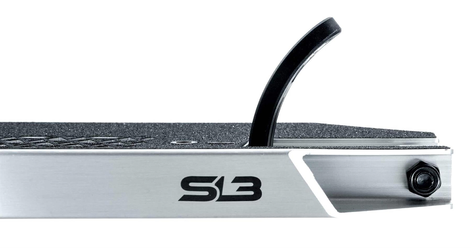 Close-up side view of the CORE SL3 Forged Polished Stunt Scooter Deck by CORE, featuring a black foot brake, “S3” logo on the side, textured grip surface, and a rear bolt for added durability. Available in 5.25" x 19.3" or 20.5".