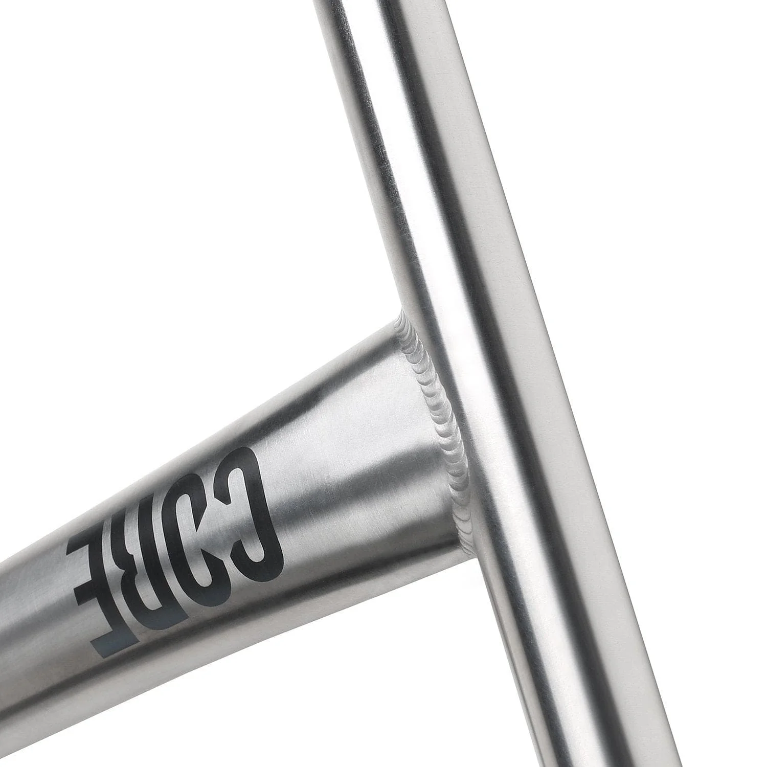 Close-up of a welded joint on a brushed metal frame, with "CORE" printed in black—showcasing the premium craftsmanship of CORE Nova V2 Titanium Oversized HIC Stunt Scooter Bars (Raw, 630mm x 610mm).