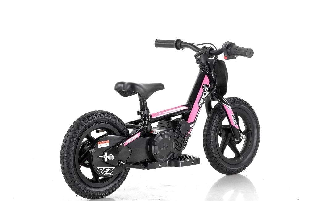 A small Revvi 12" Kids Electric Balance Bike in pink and black, featuring thick tires and sturdy handlebars, is set against a white background. This electric-powered motorbike by Revvi includes a durable frame, throttle control, and a motor positioned near the rear wheel for adventurous young riders.
