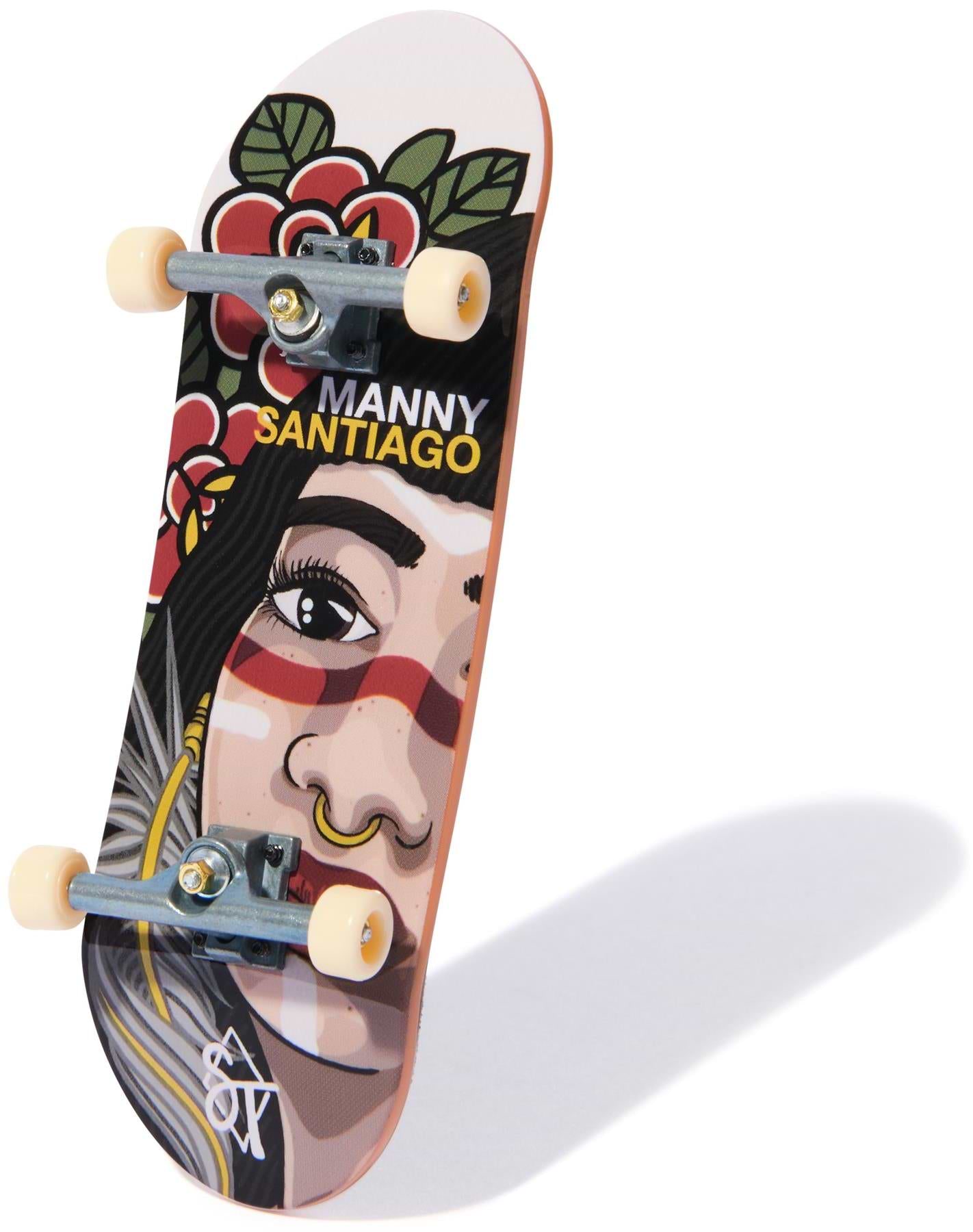 The Tech Deck 96mm M54 Fingerboard - Sandlot Times features a unique skateboard-inspired design with artwork of a woman's face with red face paint, nose ring, and floral details. "Manny Santiago" is printed above the illustration.