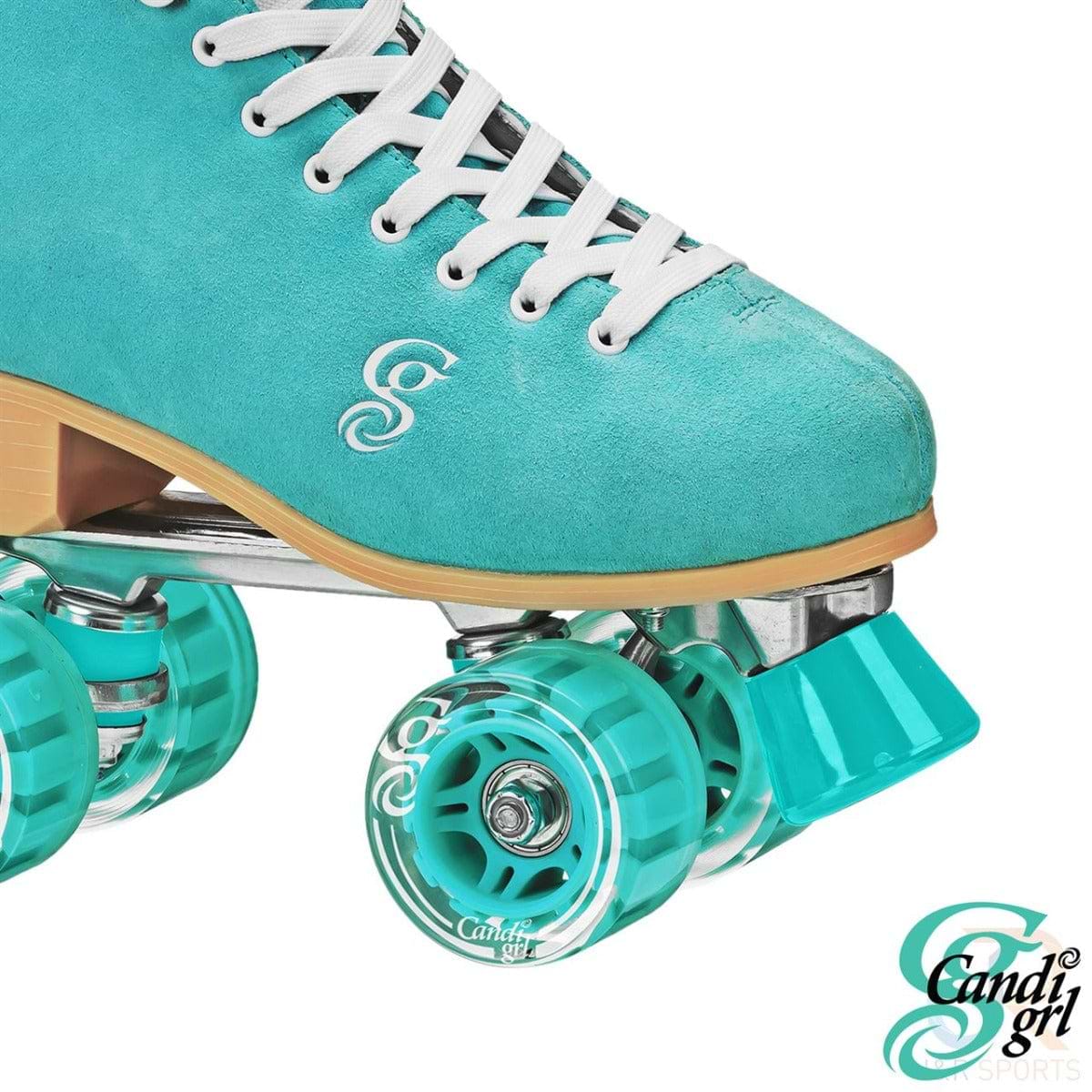 The Candi Girl Carlin Women's Quad Roller Skates in teal show off a close-up of their teal design, complete with white laces and matching teal wheels. The skates display the "Candi Grl" logo on the side, have transparent teal outdoor polyurethane wheels, and feature a teal toe stop. The brand name "Candi Grl" can be spotted in the corner.