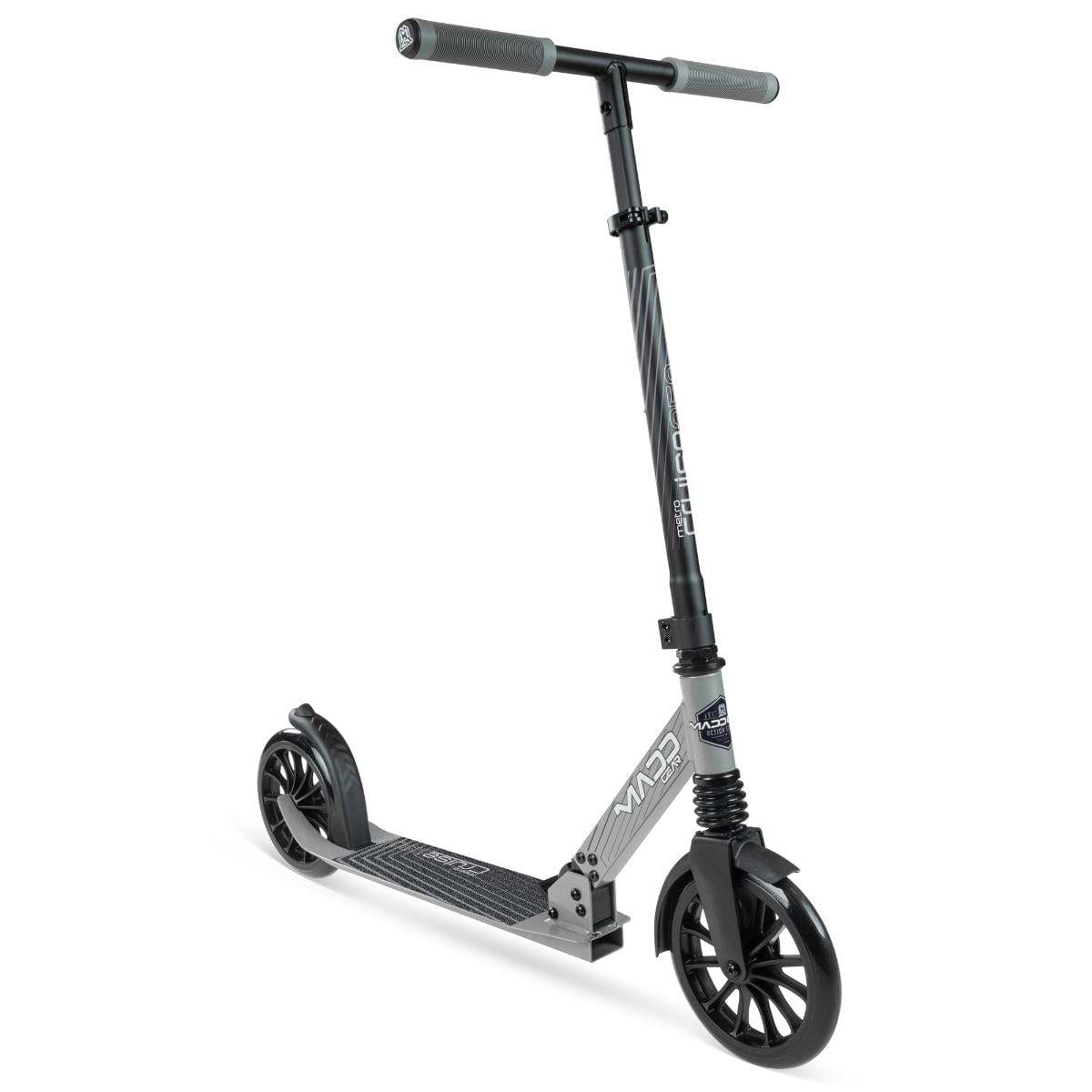 The Madd Gear Metro Cruise 250 Foldable Commuter Scooter in black/grey features large wheels, an adjustable handlebar, and a textured foot deck. Pictured against a white background.