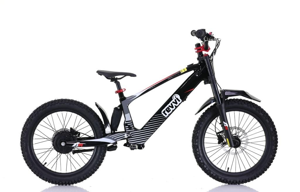 Side view of the Revvi 20" Kids Electric Balance Bike in black, featuring off-road rubber air-filled tires, red and white accents, and a visible battery pack integrated into the frame with the brand logo against a white background.