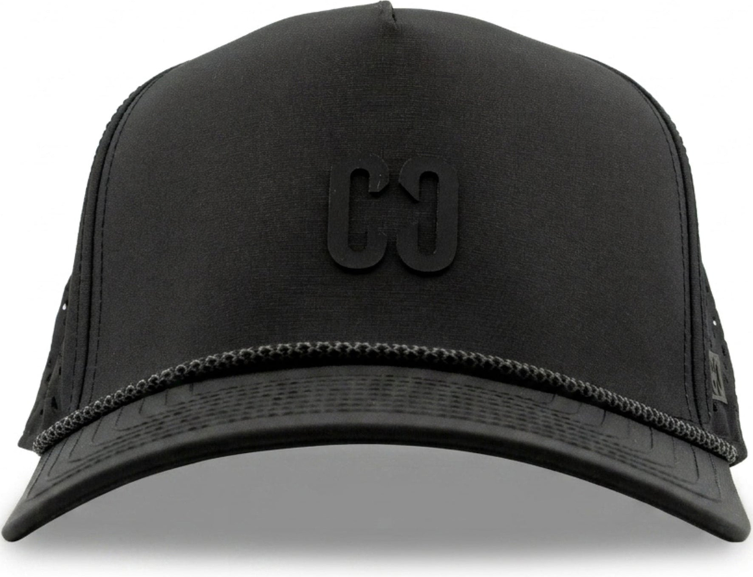 The CORE Aero Rope Cap - Black is a performance cap featuring a rounded bill, mesh back, and a raised black “CG” logo on the front. Decorative stitching accents the brim.
