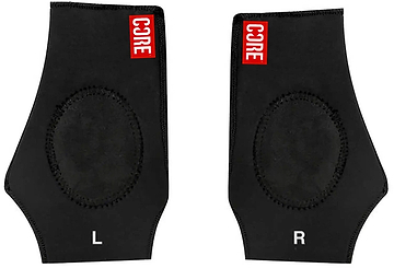 The CORE Ankle Skate Protection Sleeve - Black comes in a pair, featuring "CORE" branding at the top in red. Designed for extreme sports, these supports have shock-absorbing gel for cushioning every step. The left sleeve is marked with "L" and the right with "R," ensuring a precise fit and comfort.
