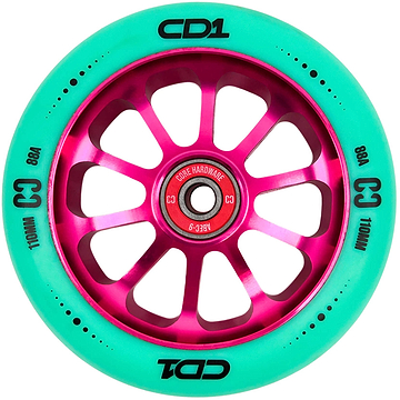 The CORE CD1 110mm Stunt Scooter Wheel - Teal / Pink features a metallic pink multi-spoke hub and teal rubber with “CD1,” “C3,” “88A,” and “110MM” in black. The bearing is visible at the center. Brand: CORE.