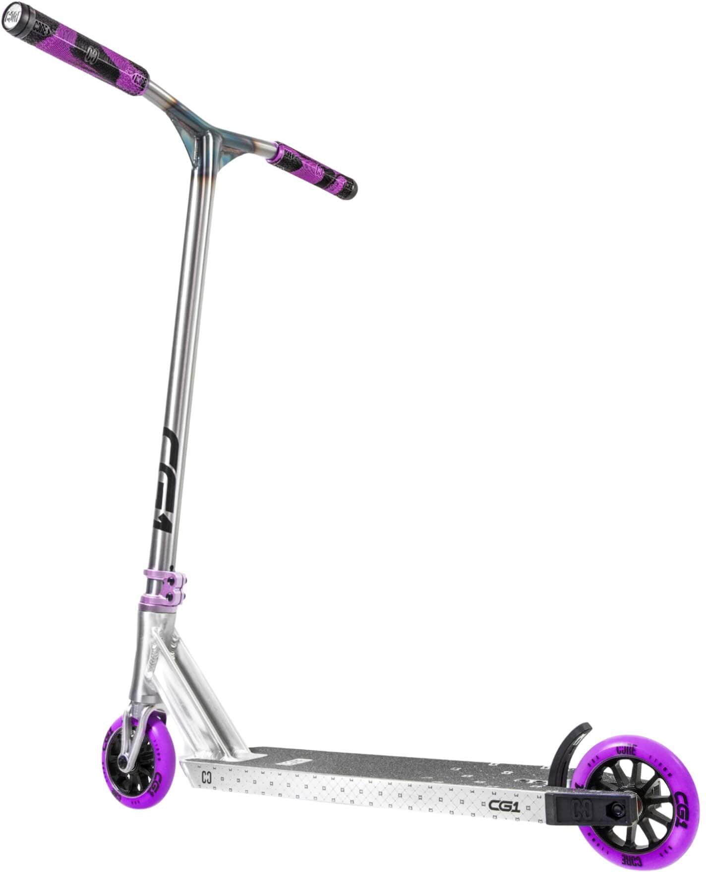 Introducing the CORE CG1 Complete Stunt Scooter by CORE—a Raw/Purple freestyle scooter showcasing black and purple handlebar grips, a vibrant purple clamp, and eye-catching purple wheels. Ideal for kids or beginners, this stunt scooter features a durable black deck with a textured grip surface and a dependable rear wheel equipped with a black fender brake for safe, stylish rides.