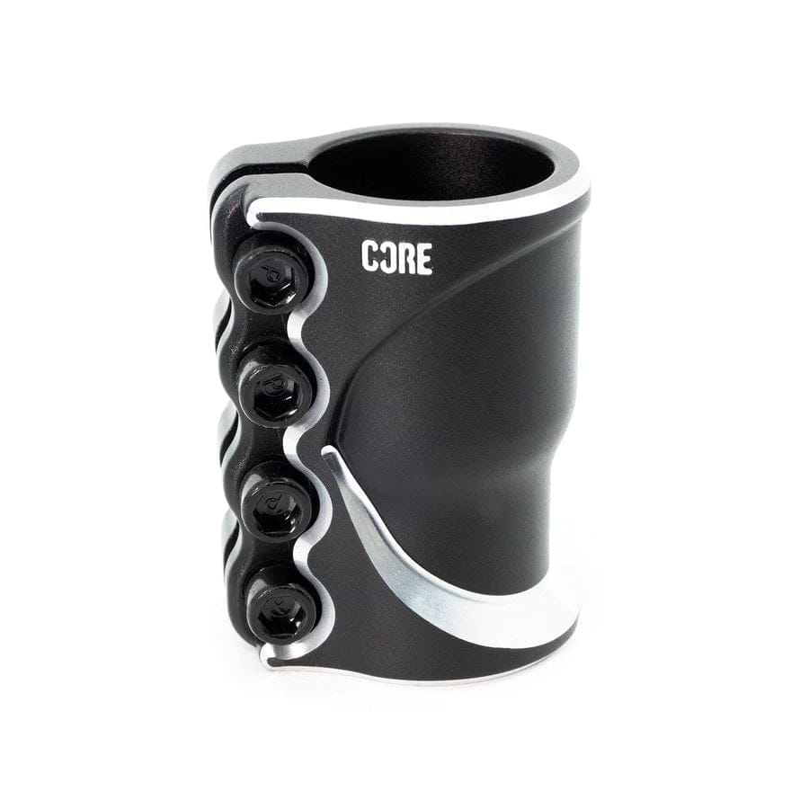The CORE Cobra 4 Bolt Oversized SCS Stunt Scooter Clamp in black, built from durable Cold Forged Aluminium 6061, includes four side bolts to securely attach components like handlebars. Its lightweight design with sleek curves prominently displays the "CORE" logo on the upper part, offering a contemporary look.