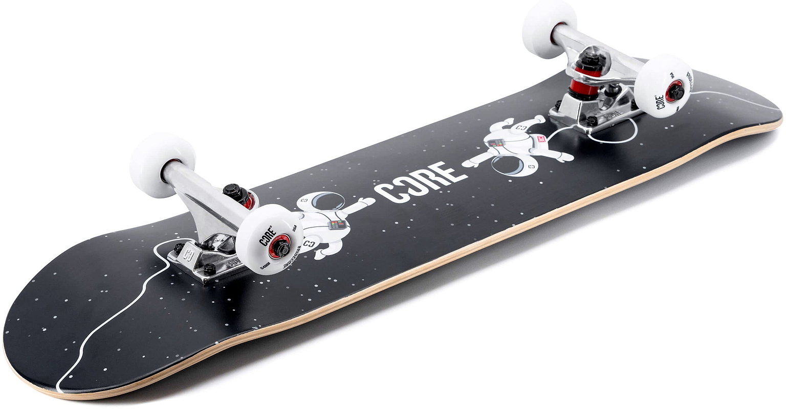 A black CORE C1 Spaceman Complete Skateboard - 7.75″ x 31″ featuring a space-themed design with two spacemen and white stars, equipped with silver trucks and white wheels.