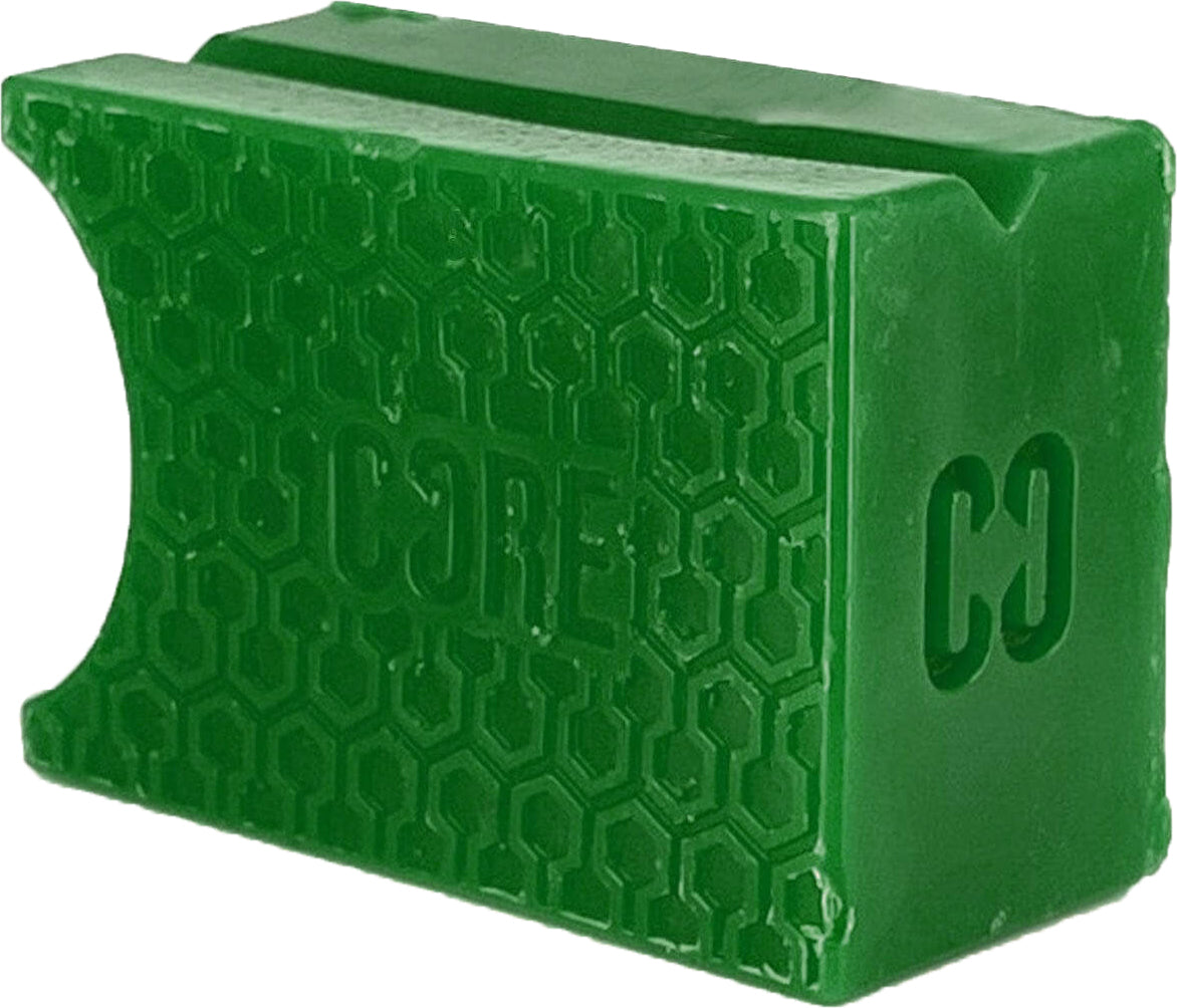 Apple green CORE Epic Skate Wax block in a rectangular shape with a honeycomb pattern and a curved cutout on one side.