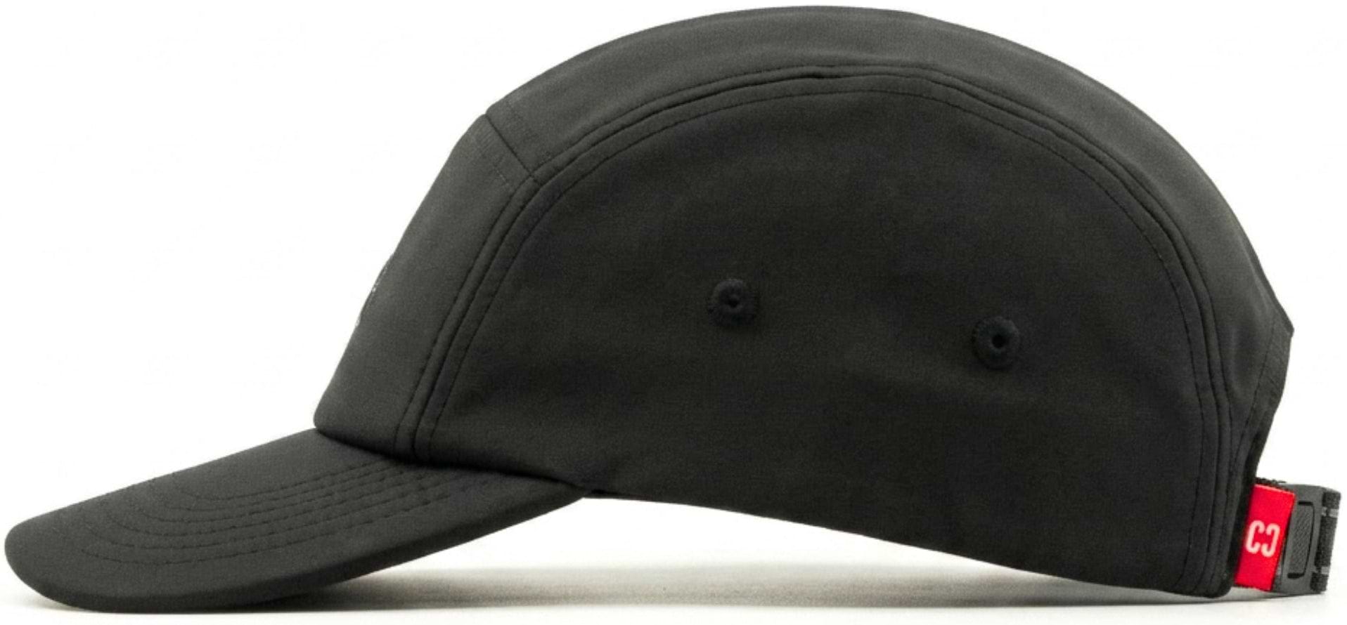 The CORE Performance Cap - Black / Reflective by CORE is crafted from breathable fabric, featuring two small side eyelets and a red adjustable strap at the back. It is presented in a side profile view on a white background.