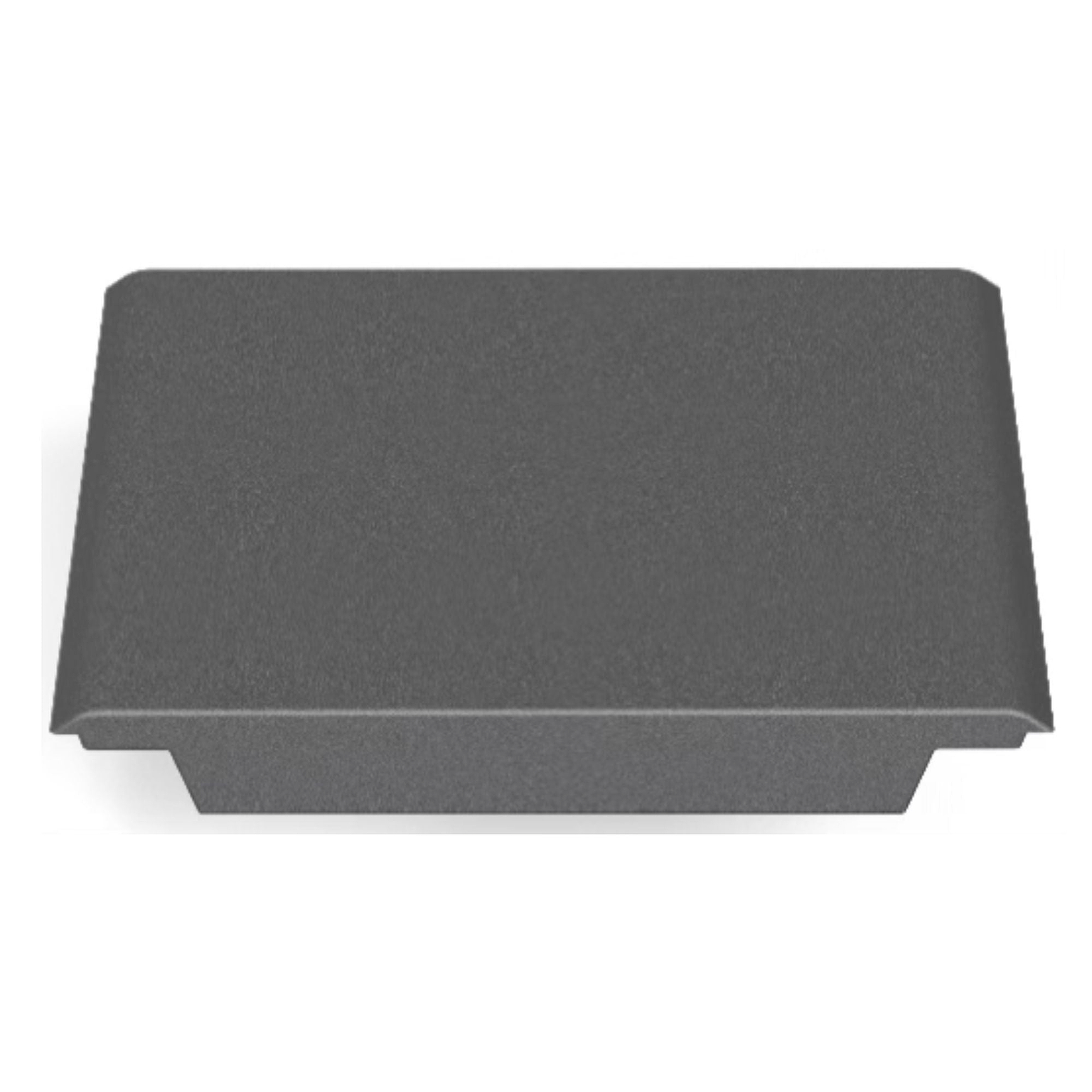 A rectangular, dark gray metal object with a flat top and curved edges, resembling the CORE Mini Funbox Ramp Set by CORE, is viewed from above against a white background.