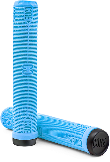 A pair of light blue CORE Skinny Boy Sky Blue Stunt Scooter Grips (170mm), made from durable rubber with textured lines and black end caps, featuring the “CORE” logo embossed on each side. Inspired by the classic design of CORE’s Skinny Boy grips, one grip stands upright while the other rests horizontally in front.