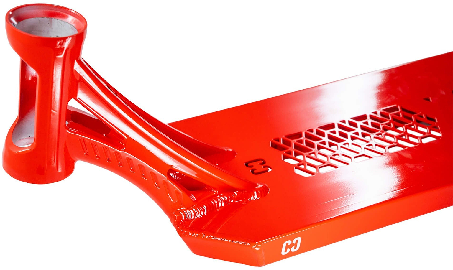 A detailed view of the CORE SL3 Forged Candy Red Stunt Scooter Deck by CORE shows its 6″ x 21″ platform featuring a curved neck and distinctive cut-out pattern near the rear, with “3” and “CO” visibly highlighting its bold design.
