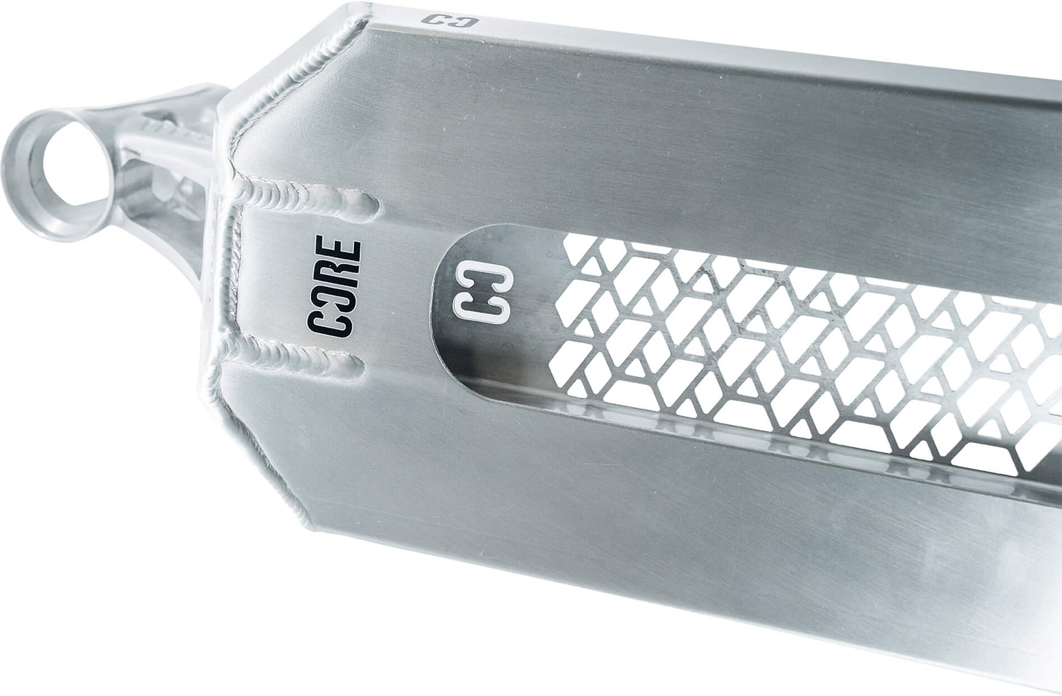Close-up of the CORE SL3 Forged Polished Stunt Scooter Deck (6″ x 21″)—a metallic deck featuring a honeycomb-patterned cutout, visible welds, and a looped end. The words “CORE” and “C3” appear in black text, highlighting hallmark design elements from the CORE brand’s SL3 series.