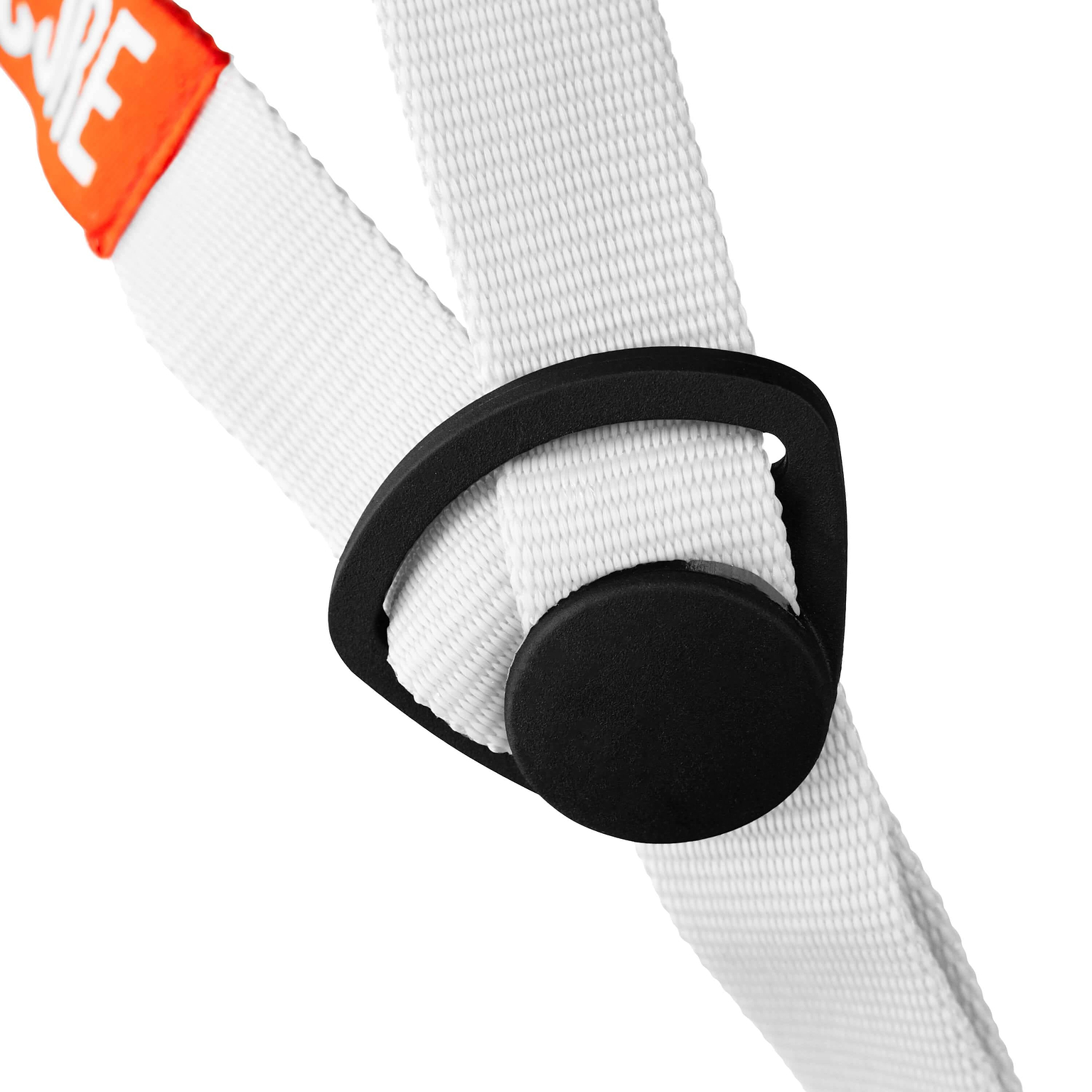 Close-up of a white nylon strap threaded through a black plastic triangular buckle with a round button, and a hint of orange material in the upper left corner—part of the secure fastening system featured on the CORE Street Skate / Scooter Helmet - Grey by CORE, making it ideal for street helmet use like skate helmets.