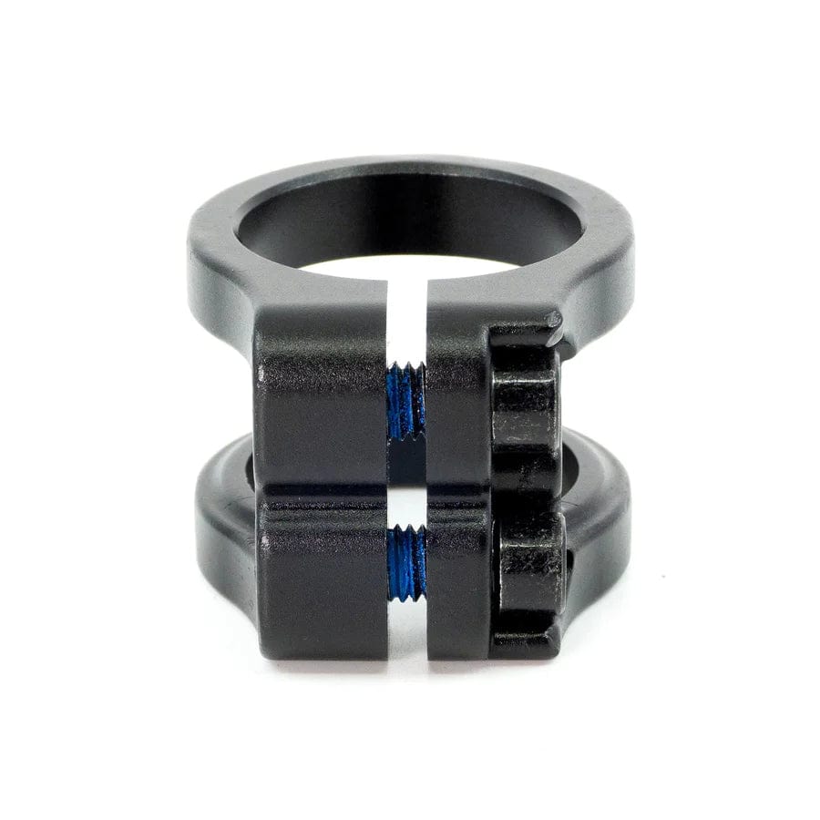 This CORE Venom 2 Bolt Oversized Stunt Scooter Clamp by CORE, with its sleek black metal design, features two parts joined by screws and a circular opening at the top, making it ideal for delivering stability and style to your scooter.