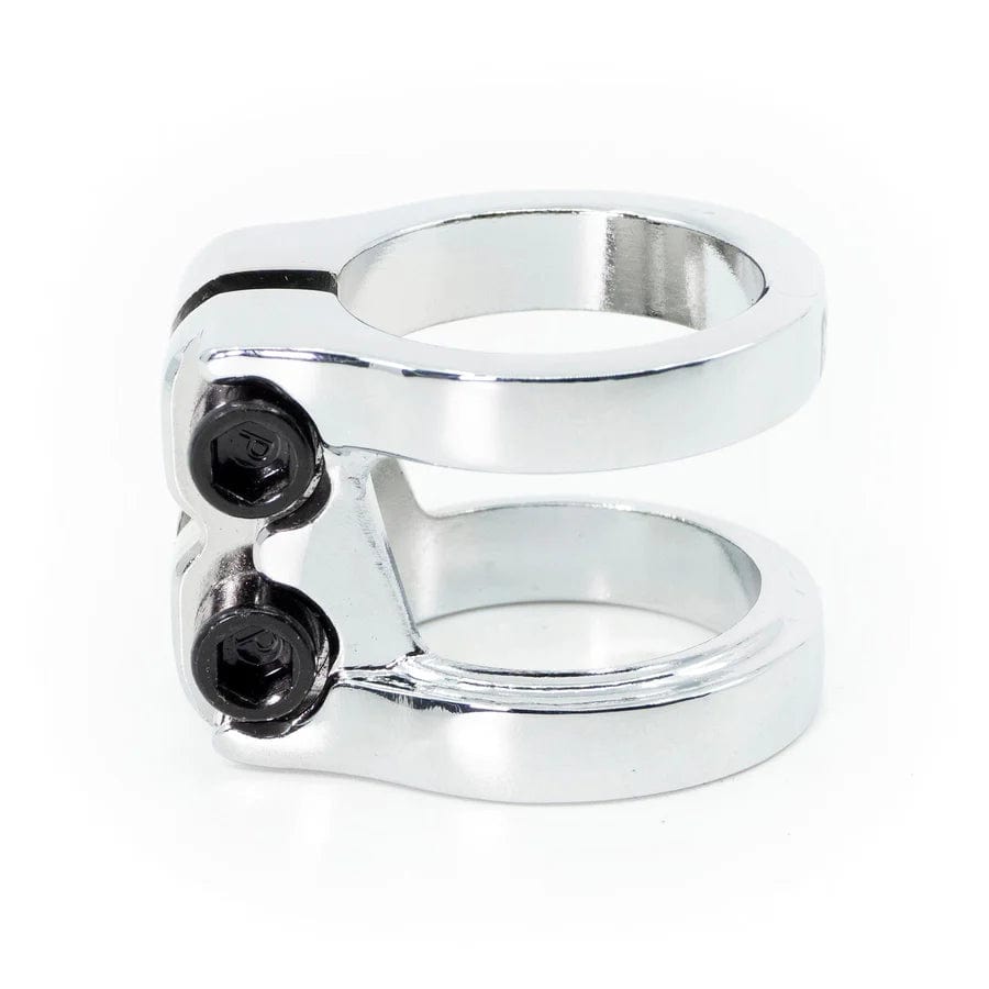 The CORE Venom 2 Bolt Oversized Stunt Scooter Clamp in Chrome, made by CORE, features a CNC machined aluminum double clamp with two black hex screws, merging lightweight design and robust functionality.