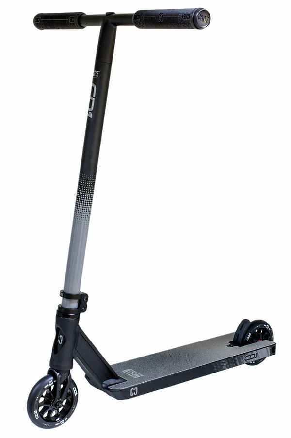 The CORE CD1 Complete Stunt Scooter - Black, crafted by CORE, is designed for beginner riders with a sleek black and gray appearance. It features a sturdy handlebar, small wheels, and an aluminum low deck, complemented by subtle gradient details on the frame to perfectly balance style and functionality for those new to scooting.
