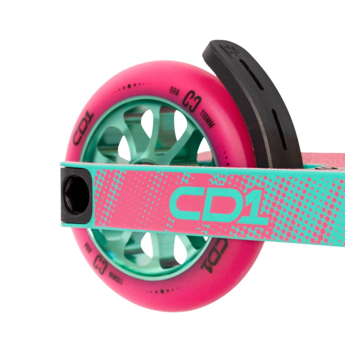 A detailed view of the CORE CD1 Complete Stunt Scooter's rear wheel reveals a striking pink and teal design. Ideal for novice riders, it includes a teal hub and black brake, with "CD1" stylishly printed on the teal deck.