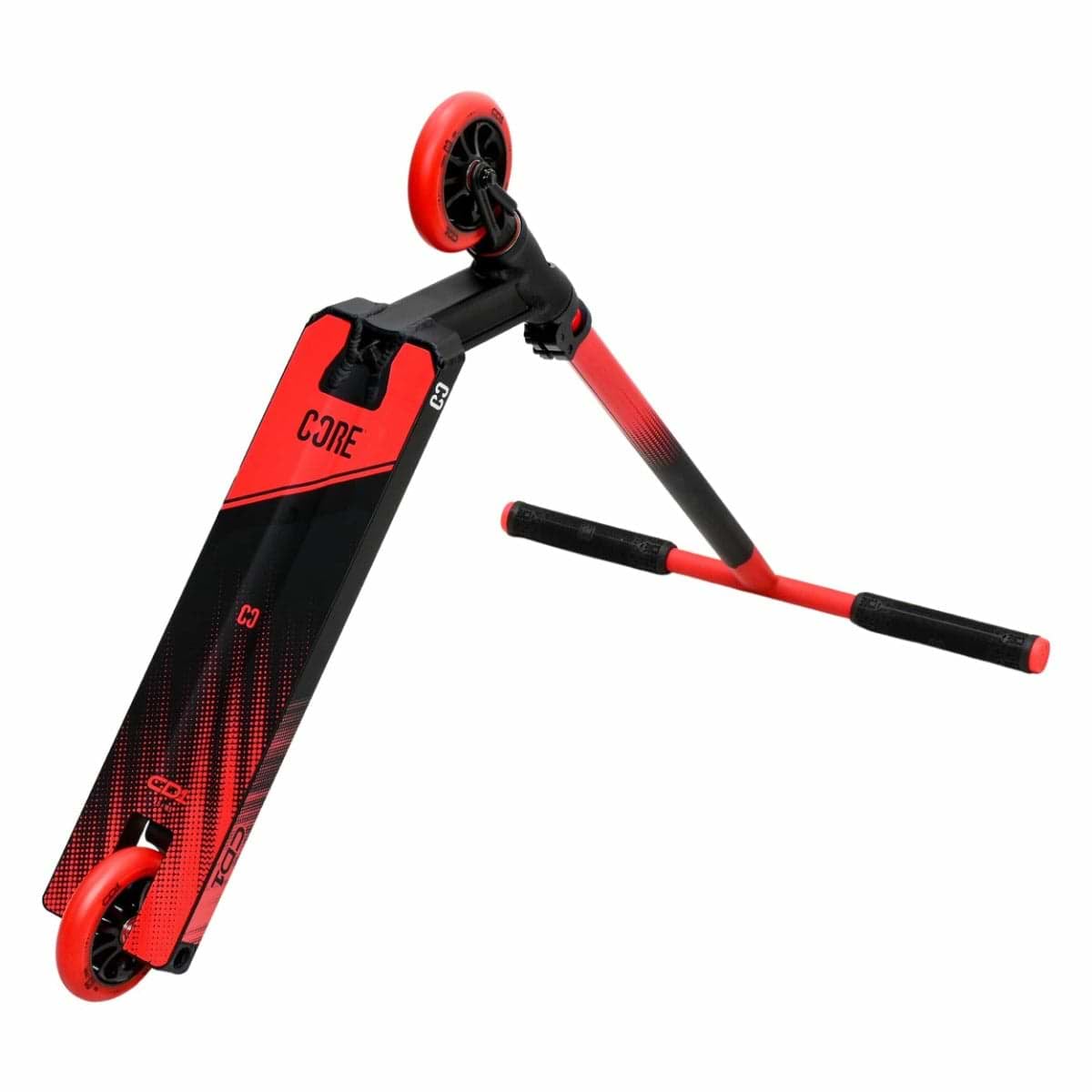 The CORE CD1 Complete Stunt Scooter boasts a sleek red and black design that is perfect for beginner riders. It includes two wheels and handlebars with segments covered in red grip tape. The aluminum deck prominently displays the word "CORE.