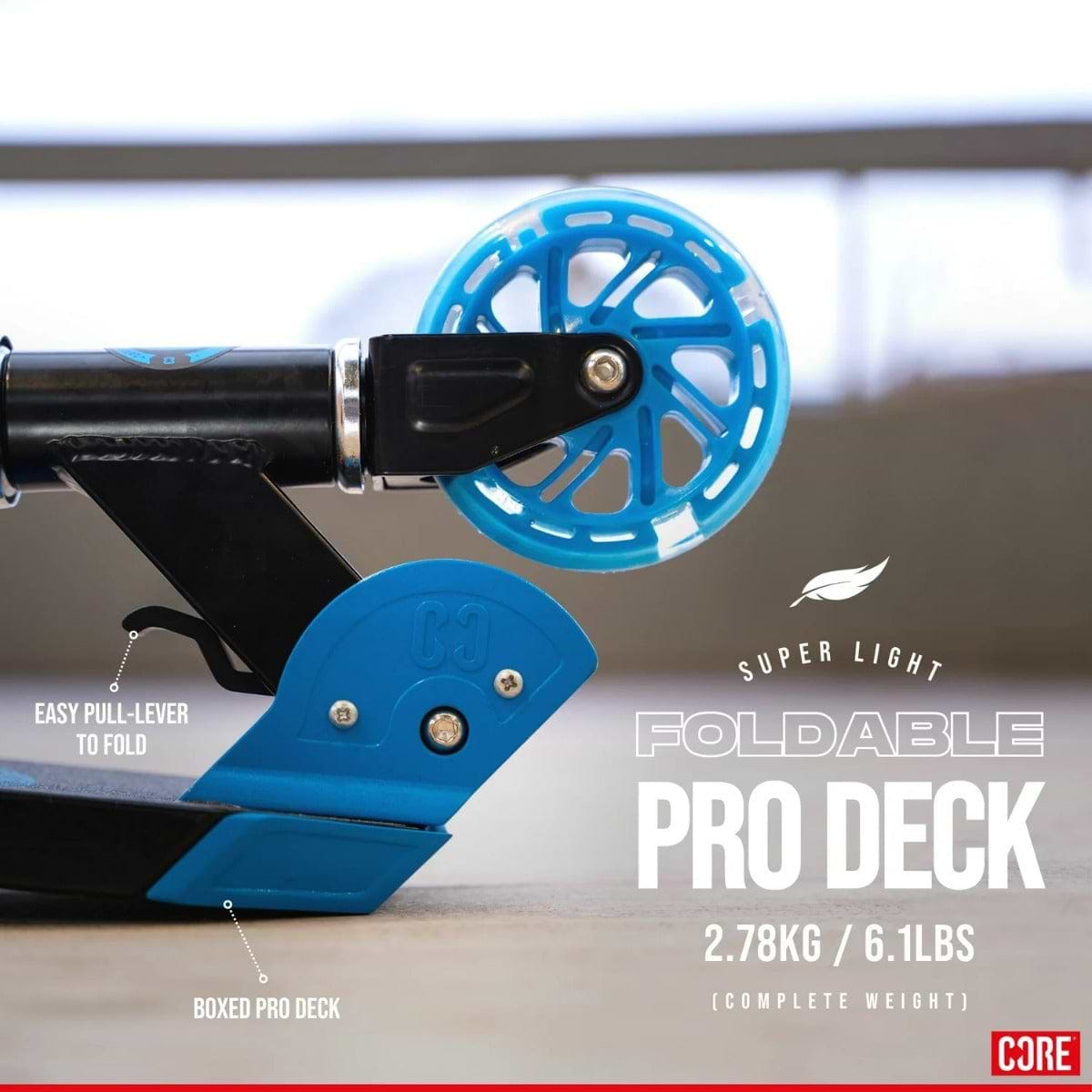 Close-up of the rear wheel and deck of the CORE Foldy Kids LED Foldable Scooter in black and blue, showcasing an easy pull-lever for folding and a boxed pro deck. Weighing just 2.78 kg (6.1 lbs), this scooter features an adjustable handlebar, making it perfect for kids.