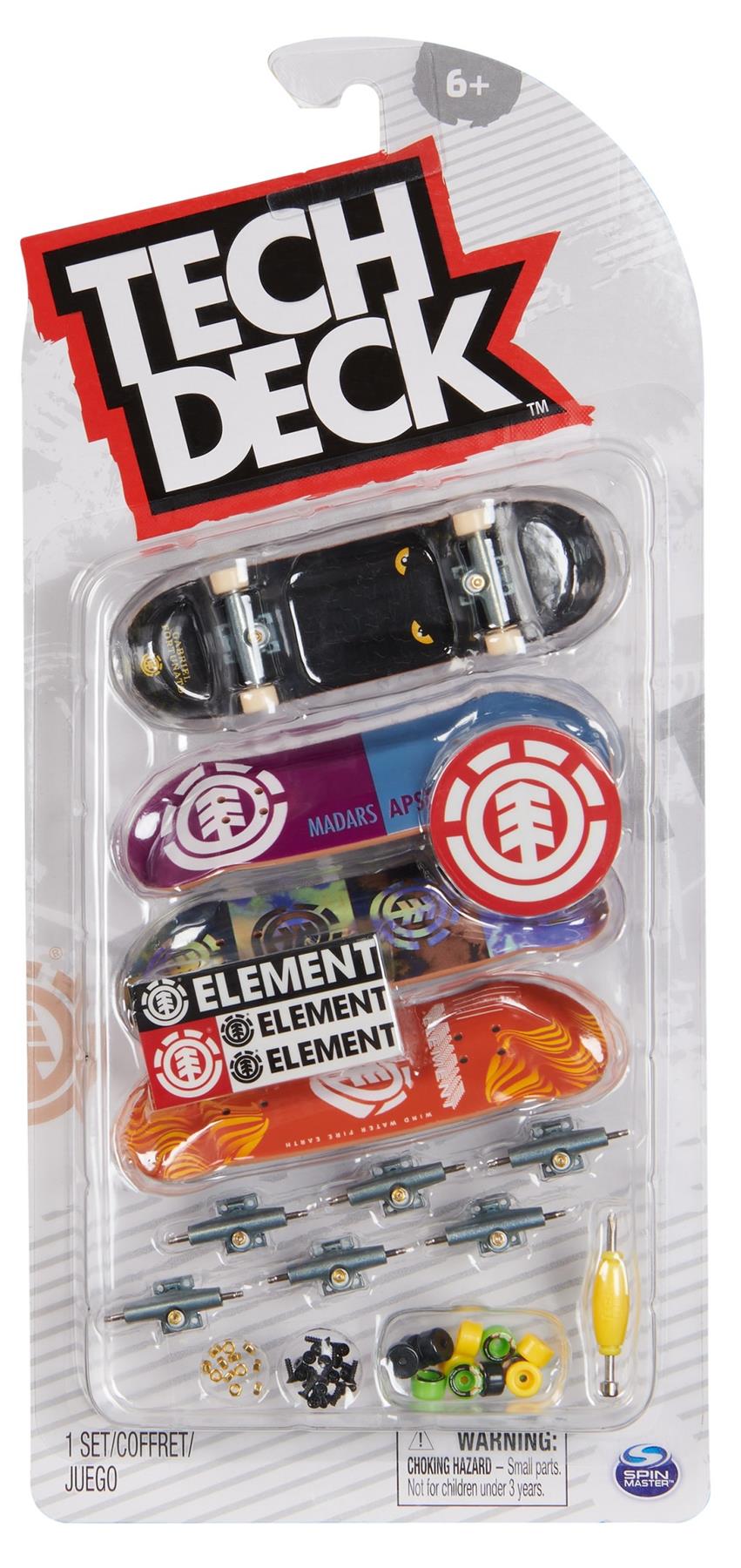 The Tech Deck M01 Deluxe 4 Pack Fingerboards - Element includes two mini skateboards with authentic graphics, extra wheels, trucks, tools, and Element stickers. Packaging shows Tech Deck and Element logos plus a choking hazard warning.