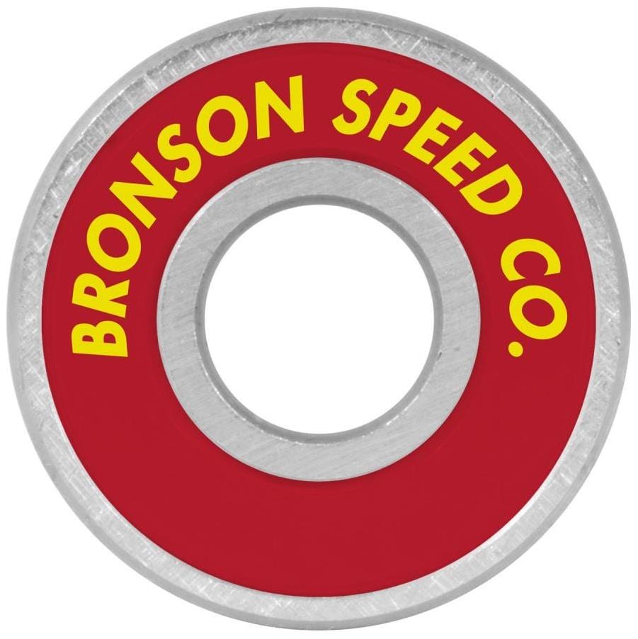 Close-up of a Bronson Fabiana Delfino Pro G3 Skateboard Bearing displaying a red outer ring with "Bronson Speed Co." in bold yellow and a meticulously crafted metallic inner circle to boost skateboard wheel performance.